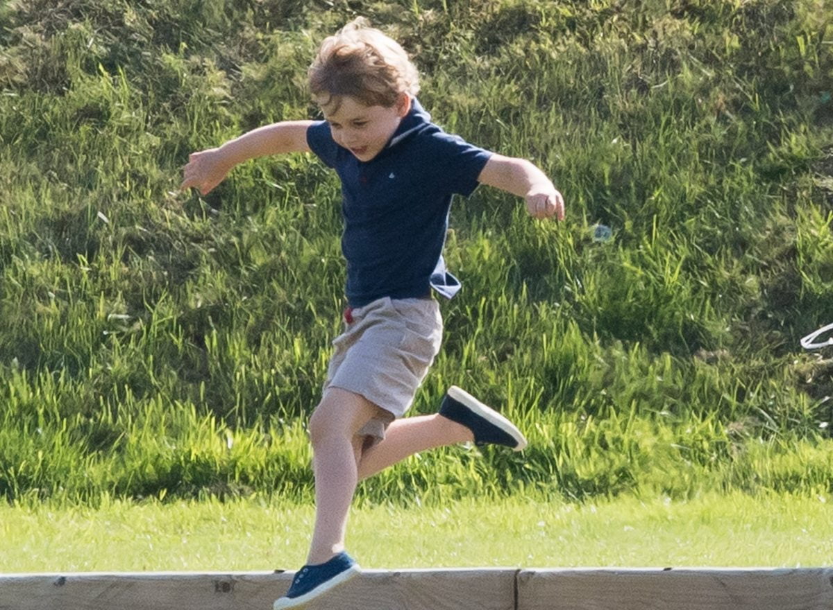 Prince George playing and leaping in the air at Maserati Royal Charity Polo Trophy | Samir Hussein/WireImage